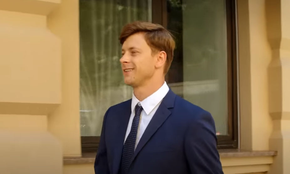 happy man in a suit walking after taking codeine addiction treatment