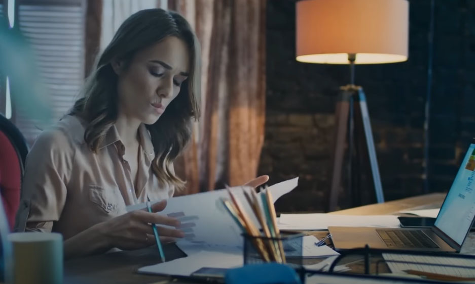 sad woman reading reports